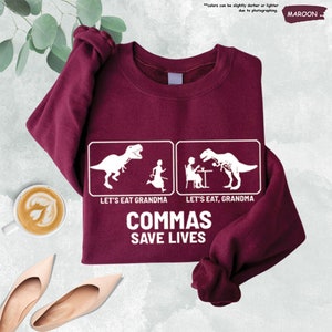 a t - shirt that says, let's eat dinosaurs, let's
