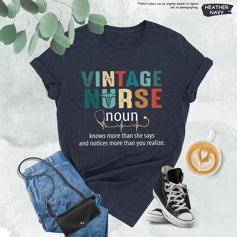 a t - shirt with the words vintage nurse on it