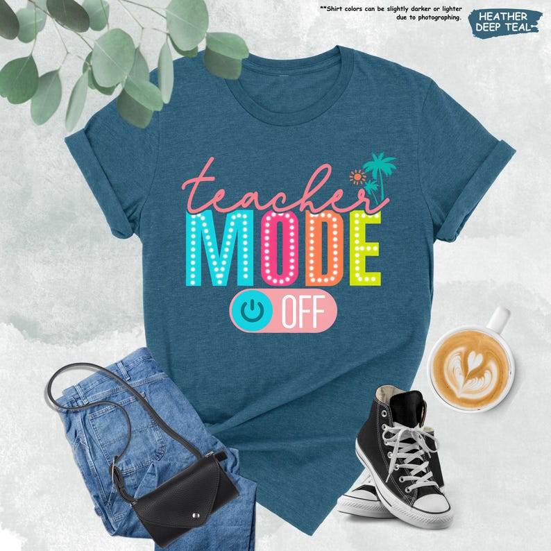 May include: A teal blue t-shirt with the text "teacher MODE OFF" in colorful letters with a light blue and pink power button graphic.