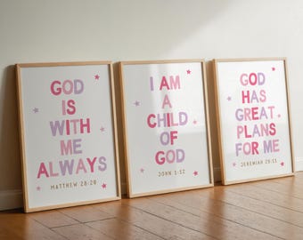 May include: Three framed art prints with inspirational quotes in pink and purple lettering. The prints include the phrases "God is with me always," "I am a child of God," and "God has great plans for me."