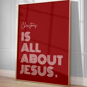 Puede incluir: Un póster rojo con texto blanco que dice "Christmas is all about Jesus." El texto está en una fuente en negrita y estilizada.