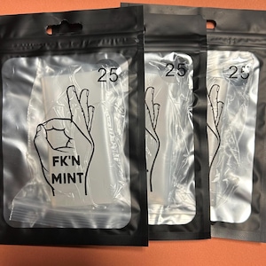 3 25mm 3 1/4 DuraMint sleeves.   Even adding a cool sticker