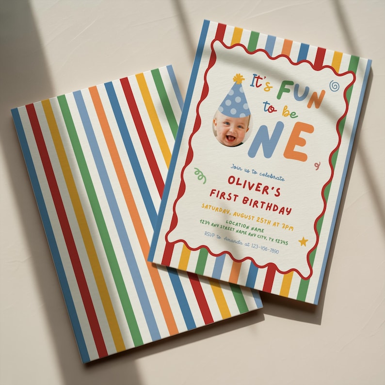 May include: Two colorful birthday invitations. One features a photo of a baby wearing a party hat and the text "It's FUN to be ONE." The other has a striped pattern in red, blue, green, orange, and yellow.