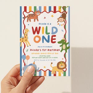 May include: A colorful invitation for Oliver's 1st birthday. The design features a "WILD ONE" theme with cartoon animals like a tiger, monkey, giraffe, crocodile, elephant, and lion. The invitation includes event details: date, time, location, and RSVP information.