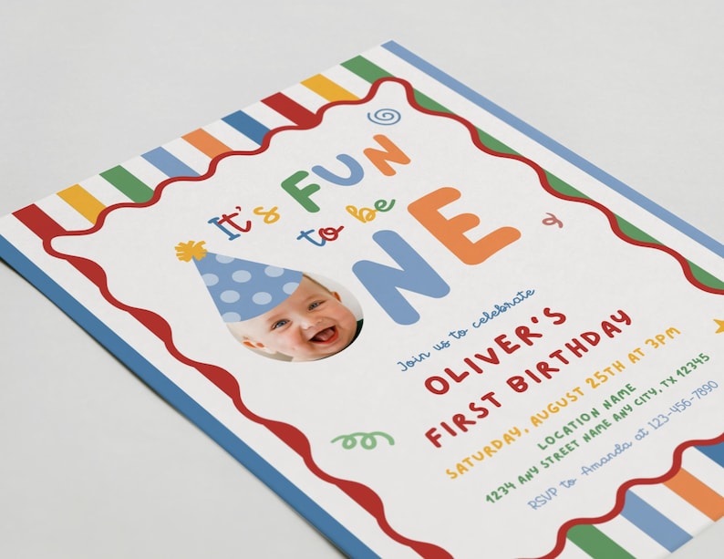 May include: A colorful birthday invitation with the text "It's FUN to be ONE." The invitation features a photo of a baby wearing a party hat. The invitation includes the text "OLIVER'S FIRST BIRTHDAY" and event details.