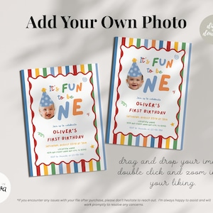 May include: Two birthday invitations with the text "It's FUN to be ONE" and a photo of a baby wearing a party hat. The invitations have a colorful striped border and include event details.