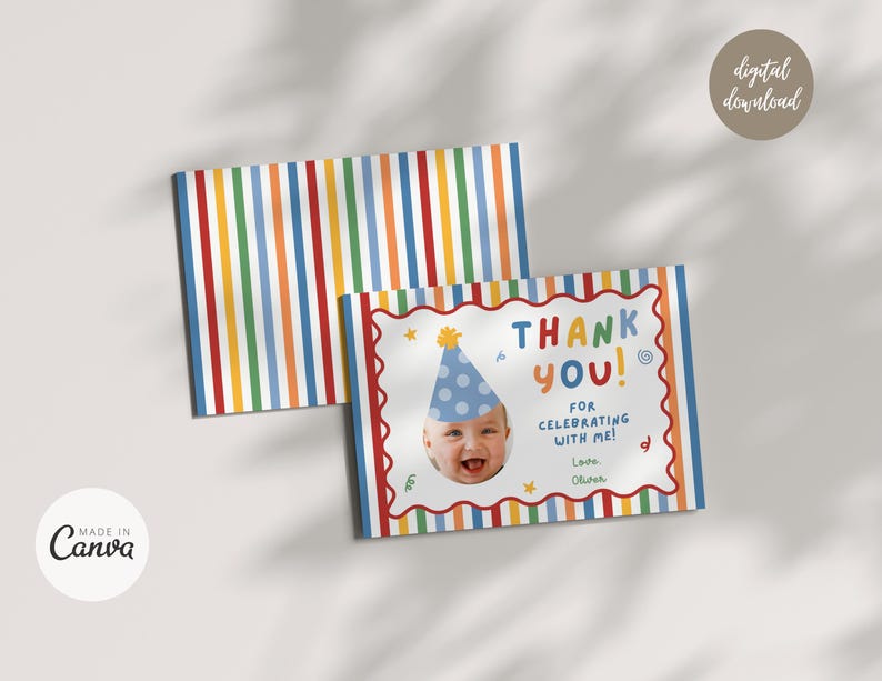 May include: A rectangular thank you card featuring a colorful vertical striped pattern in red, orange, yellow, green, and blue. The card displays a photo of a smiling baby wearing a blue polka dot party hat, with the text THANK YOU! FOR CELEBRATING WITH ME! Love, Oliver.