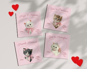 May include: Four Valentine's Day cards with kitten illustrations. Each card features a kitten inside a pink heart, with phrases like "Hugs & Kittens" and "You're Pawsome." Two red heart cutouts are also visible.