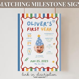 May include: A colorful milestone sign with the text "OLIVER'S FIRST YEAR". The sign includes a photo of a baby wearing a party hat, and details such as height (30 inches), weight (24 pounds), and the date May 25, 2023.