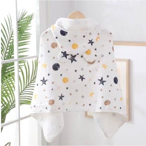 Hooded Muslin Towel and robe for toddlers, great for swimming , bath time and made from soft muslin material that is extremely absorbant.