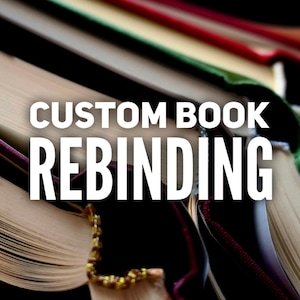 May include: Image of several books with visible pages and colorful spines. The text "CUSTOM BOOK REBINDING" is overlaid on the image in white, bold letters. The books are arranged at an angle, creating a visually appealing composition.