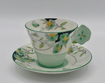 Rare find! 1930s Art Deco antique Paragon Daisy cup and saucer with flower shaped handle, made in England.