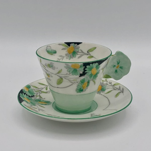 Rare find! 1930s Art Deco antique Paragon Daisy cup and saucer with flower shaped handle, made in England.