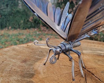 escultura decorativa de mariposa