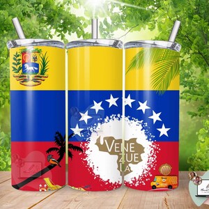 May include: Three stainless steel tumblers with lids and straws. Each tumbler features a design inspired by the Venezuelan flag, with yellow, blue, and red sections. One tumbler displays the Venezuelan coat of arms, while others show stars, palm leaves, and the country's name.
