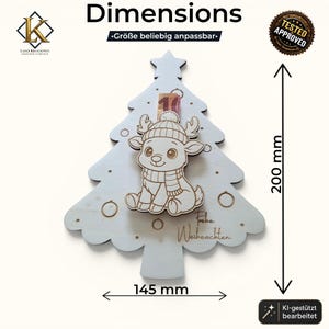 May include: A light-colored wooden Christmas tree ornament featuring a central reindeer illustration wearing a hat and scarf. The ornament includes the text "Frohe Weihnachten" and measures 200 mm in height by 145 mm in width. It has a star at the top and circular decorative cutouts.
