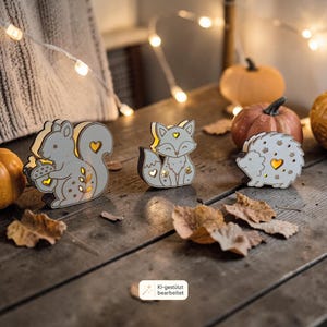 May include: Three light-up wooden animal figures featuring a squirrel holding an acorn, a fox, and a hedgehog. Each figure is crafted from light-colored wood with cut-out heart and leaf shapes that emit a warm, glowing light from within.