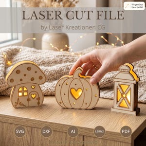 May include: Three light-colored wooden laser-cut decorations featuring a mushroom house, a pumpkin with a heart cutout, and a lantern. Each piece is illuminated from within, casting a warm glow through the cutouts on a wooden surface.