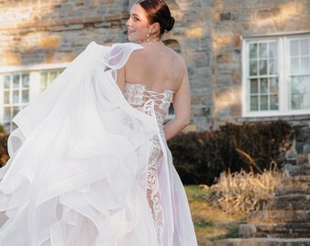 Wedding dresses. Custom Made to order We can make any dress you want. We specialize in unique designs and all sizes.