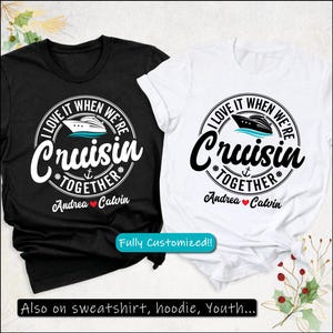 May include: Black and white t-shirts with a cruise ship graphic. The shirts have the text "I love it when we're Cruisin' Together" with the names "Andrea" and "Calvin" below. The shirts are fully customizable and also available on sweatshirts, hoodies, and youth sizes.