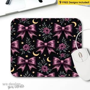 May include: Rectangular mousepad with a repeating pattern of purple bows, roses, crescent moons, and stars on a black background. The mousepad is next to a white computer mouse. The text "9 FREE Designs Included!" is in the top right corner.