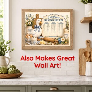 May include: A framed wall art print titled Farmhouse Baking Helper featuring a white duck with a blue checkered bow, a bowl of eggs, a wooden rolling pin, a butter stick, and a flour sack, alongside a printed chart of baking conversions.