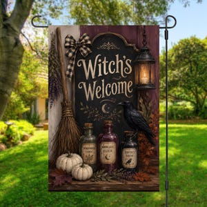 May include: A rectangular garden flag featuring a black sign with the text Witch's Welcome, a broom, a black and white plaid bow, a hanging lantern, a black crow, and three glass bottles labeled Wormwood Tonic, Moonlight Elixir, and Raven's Brew.