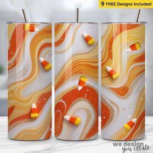May include: Three stainless steel tumblers with a swirling orange, yellow, and white design, decorated with candy corn. Each tumbler has a silver straw and the text "9 FREE Designs Included!" is visible.