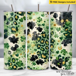 May include: Three stainless steel tumblers with St. Patrick's Day themed designs. The designs feature green shamrocks, hearts, and leopard print patterns with gold accents. The tumblers have a straw and the text "9 FREE Designs Included!"