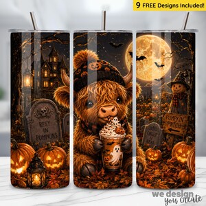May include: A cylindrical tumbler featuring a Halloween-themed design with a fluffy highland cow wearing a pumpkin-patterned beanie and holding a ghost-topped drink. The background displays a haunted house, a full moon, bats, and pumpkins.