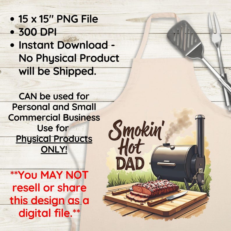 May include: A beige apron with the text "Smokin' Hot Dad" and a cartoon illustration of a smoker with smoke coming out of it. The smoker is on a wooden surface with a piece of meat on a cutting board.