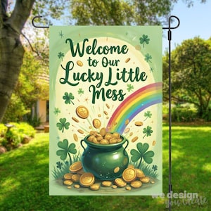 May include: A St. Patrick's Day garden flag with a green background, featuring a pot of gold, rainbow, and the text "Welcome to Our Lucky Little Mess." Gold coins and shamrocks are scattered around the design.