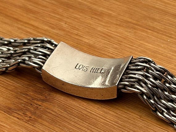 The LOIS HILL mark, photographed on a piece