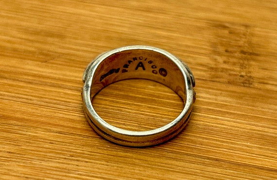 The Sterling FRANCISCO A mark, photographed on a piece
