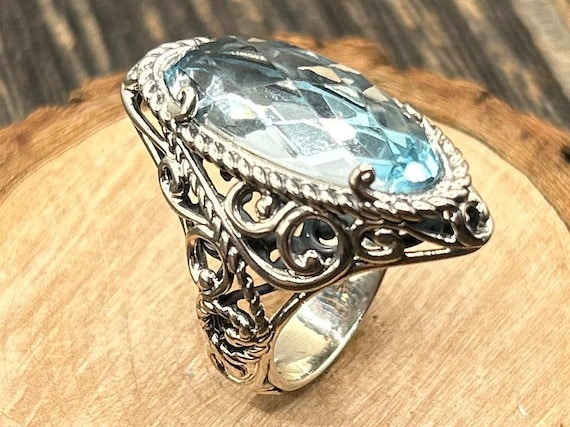 Southwestern Allure: Carolyn Pollack Blue Topaz & Sterling Silver Ring, Size 8 - NOS