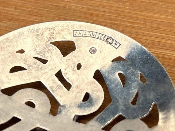The KK mark, photographed on a piece