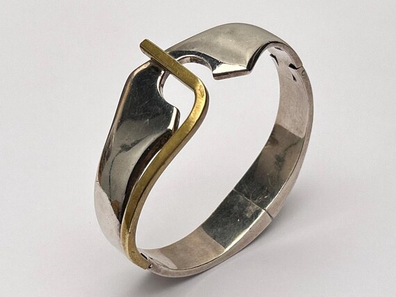A Stunning Vintage Modernist Taxco Mexican Sterling Silver and Brass Cuff Bangle Bracelet by Alicia