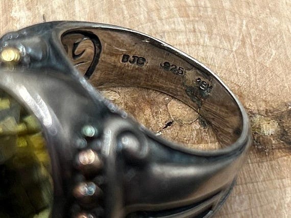 The BJC mark, photographed on a piece