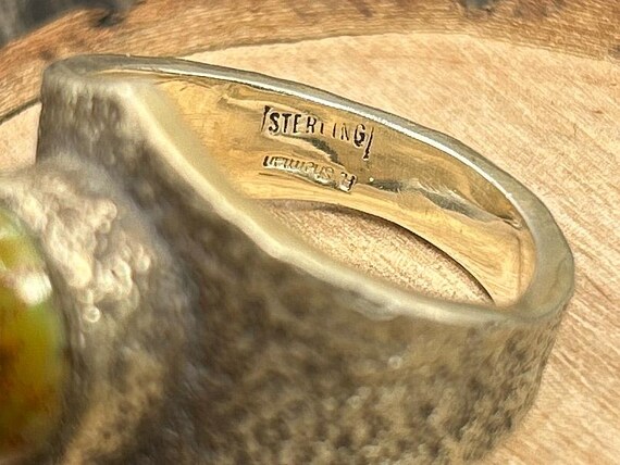 The R. Sherman mark on this piece