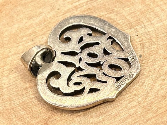 The AVERY mark, photographed on a piece