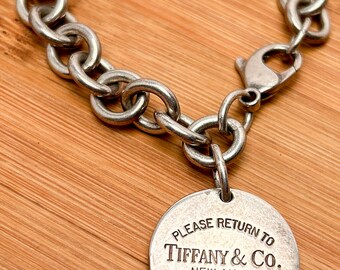 Tiffany & Co. スターリングシルバー クロス型チャーム Tiffany & Co. Sterling Silver Round Tag Lobster Claw
