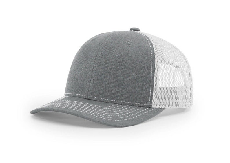 May include: A gray and white trucker hat with a mesh back. The hat has a curved brim and a white stitching detail.
