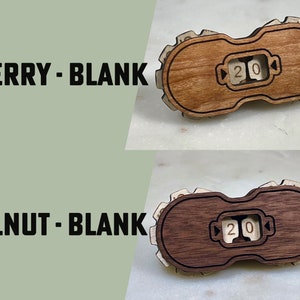 May include: Two wooden counter wheels with a number display showing "20". The top wheel is cherry wood and the bottom wheel is walnut wood.