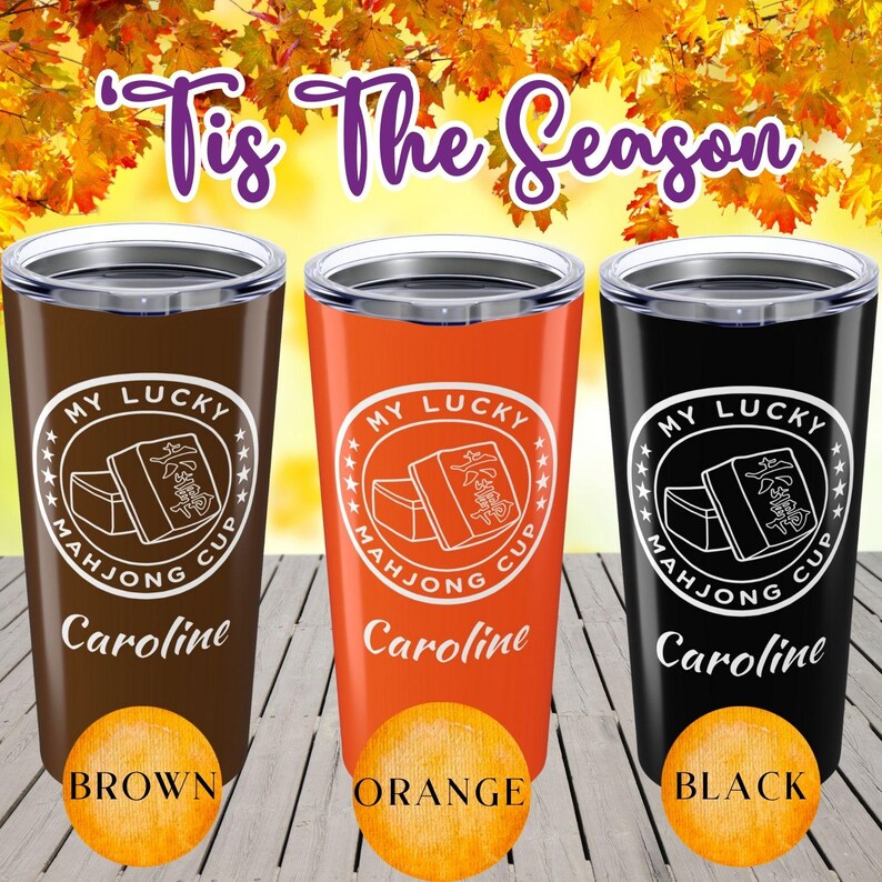 May include: Three insulated tumblers in brown, orange, and black, each with a silver rim and lid. The tumblers feature a white circular design with the text "MY LUCKY MAHJONG CUP" and a personalized name. The words "Brown", "Orange", and "Black" are below each tumbler.