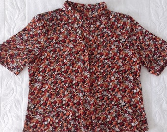 Vintage blouse with a floral pattern