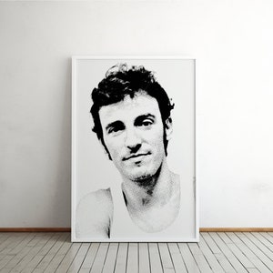 May include: Black and white portrait of a man with short dark hair wearing a white tank top.