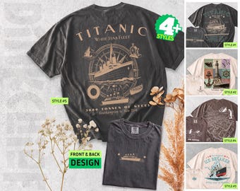 May include: A charcoal gray t-shirt featuring a large back graphic of the Titanic ship, a compass, and the text Titanic White Star Fleet 3000 Tonnes of Steel Southampton to New York. The front shows a small ship graphic with stars.