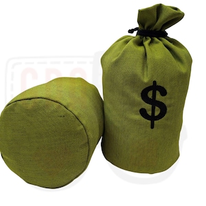 May include: Two green burlap money bags. One bag is upright with a black dollar sign, and the other is lying on its side. The bags are made of a textured fabric and have a drawstring closure.