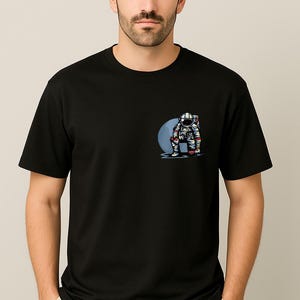 Minimal Astronaut T-Shirt – Space Explorer Graphic Tee – Cosmic Universe Design Shirt – Unisex Casual Streetwear Top - Gift For Him Her
