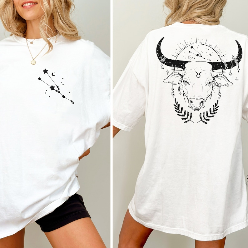 May include: White oversized t-shirt with a black Taurus constellation graphic on the front and a black Taurus bull graphic on the back.